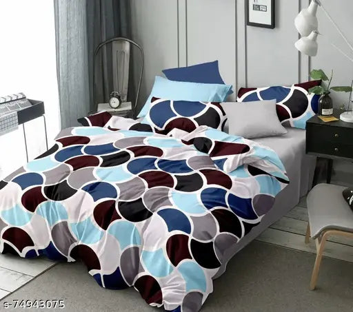 Glace Cotton geometric patterned double bedsheet set with two pillow covers (72x78 inches, 18x28 inches), elastic corners and 10-inch skirt, machine washable, Indian origin