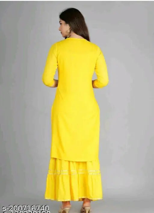 Yellow embellished Rayon sharara kurti with three-quarter sleeves, perfect for festivals, parties, office, and daily wear. Hand-mirror work, best quality Reyon fabric. India origin