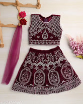 Taffeta silk girls lahanga, embroidered with stitched net. Sleeveless, available in sizes from 12-18 months to 7-8 years. Indian handcrafted traditional wear