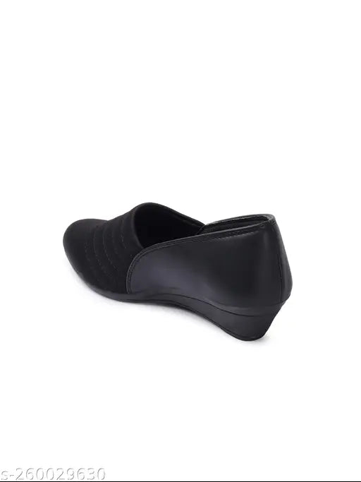Black synthetic sneakers by Furiozz - Solid design with closed back, offering comfort and style for women's fashionable look. Comfortable sole ensures optimal grip and durability. Made in India, sizes available from IND-3 to IND-8