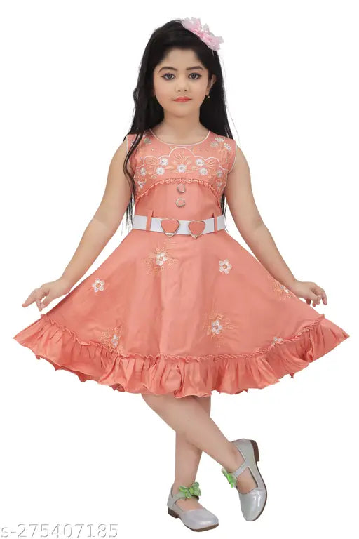 Peach rayon girls' frock with embroidery work, perfect for summer