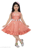 Peach rayon girls' frock with embroidery work, perfect for summer