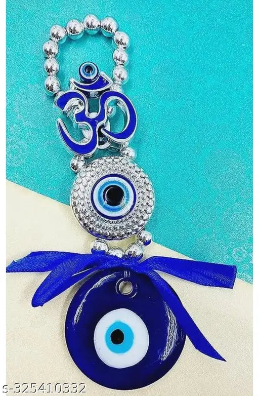 Om Blue plastic Nazar Battu for home decor, ideal for Vastu/Feng Shui, protective evil eye hanging for entrances