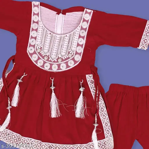 Beautiful yellow rayon kurti set for kids party wear, trendy Naira style with A-line top and pyjama bottoms, embroidered pattern, three-quarter sleeves. Vibrant colors, gentle on skin, machine washable, sizes 9-12 months to 4-5 years, Indian origin