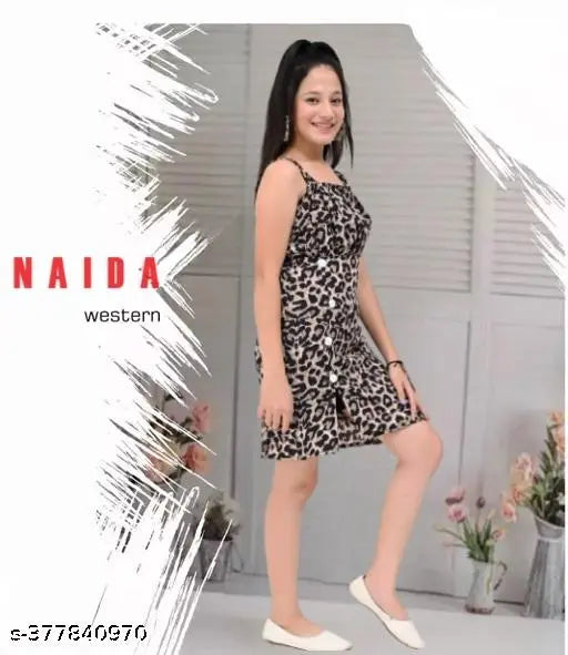 Leopard printed crepe knee-length dress with belt, perfect for every occasion. Girls' floral partywear