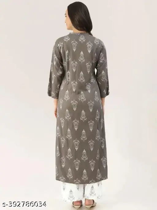 Grey rayon kurti and palazzo set with printed design, three-quarter sleeves, for women and girls. 100% rayon material. Single set in sizes S-XXXXL. Indian origin