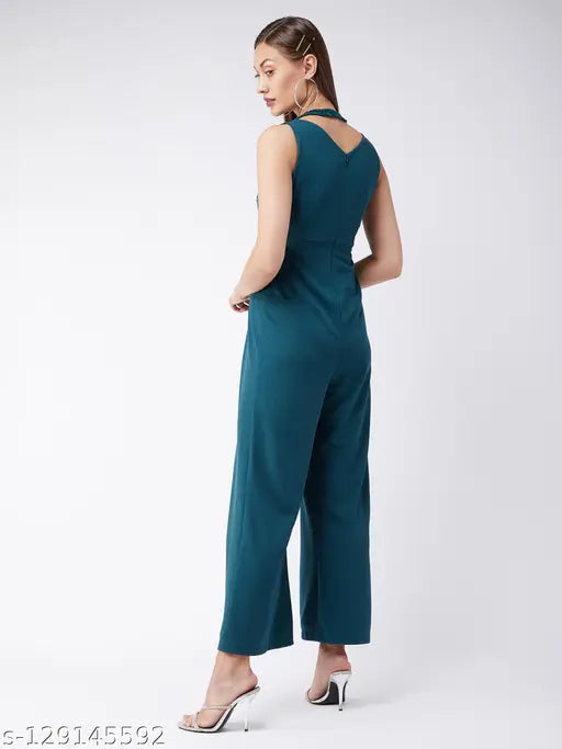 Green polyester Miss Chase jumpsuit, sleeveless halter neck with sequin embellishments and deep v backline