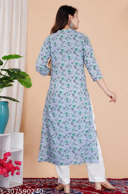 Pink rayon straight kurti, ethnic motif printed, three-quarter sleeves. Indian women's fashion on mannequin