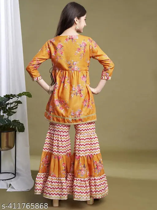 Floral printed polycotton Kurta set with Sharara, mustard and violet hues for girls aged 8-15 years. Traditional Anarkali silhouette with 3/4 sleeves and delicate lace border