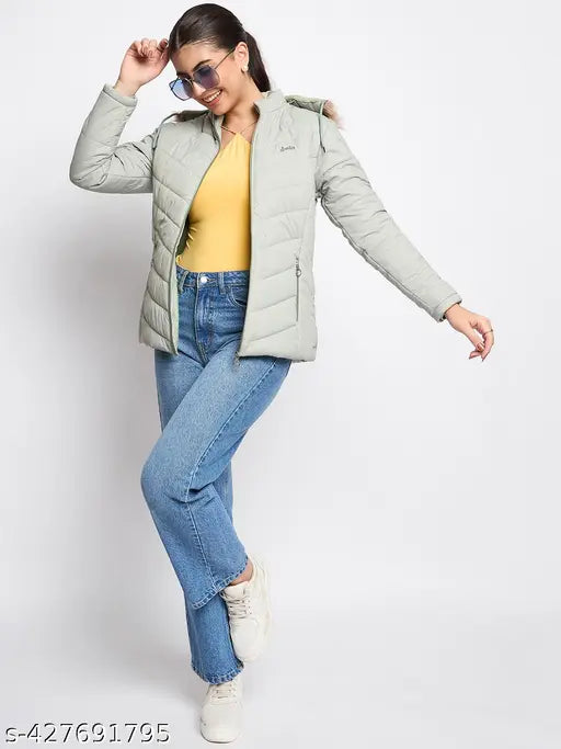 Women's solid nylon hooded jacket with long sleeves, zip closure, and side pockets. Ideal for casual occasions. Made in India