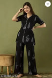 Elegant rayon nightsuits, printed net design for women, trendy nightwear on display