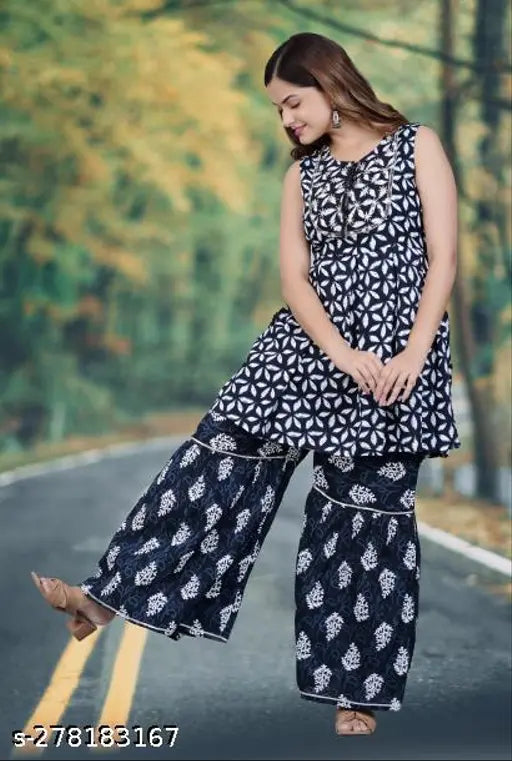 Black Rayon-Viscose Sharara Set with Kurta & Dupatta - Traditional Indian fashion, printed net design, sleeveless kurta, elastic waistband sharara, perfect comfort and style