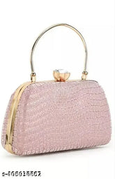 Pink suede, metal-framed clutch bag. Embellished, suitable for weddings, parties, or formal events