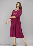 Embroidered rayon women's wine kurta, three-quarter sleeves, vibrant Indian fashion on hanger