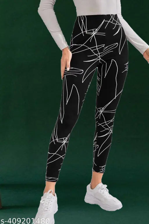 Black printed lycra jeggings for women's yoga and workout by DTR Fashion, full-length with elastic waist, available in sizes 26, 28, 30, 32, 34, 36