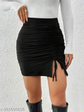 Black cotton blend mini pencil skirt with textured solid pattern and slim body fit, knee-length, stretchable, and pull-on closure. Available in sizes 26, 28, 30, 32, made in India