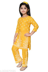Ethnic Rayon Kurta Palazzo set for girls, featuring printed design and comfortable palazzos. Exquisite craftsmanship and intricate details make this Indian ensemble a must-have for any occasion. Sizes range from 4-5 years to 8-9 years
