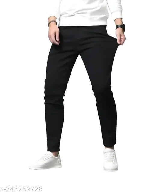 Stylish latest men's black denim jeans, solid pattern, versatile fit with slight stretch, machine washable, resistant to fading, available in sizes 28, 30, 32, 34 (w: 29/31/33/35, l: 38in), India origin