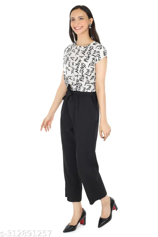 White polka dot crepe jumpsuit with black bottom, 'Tokyo' design, available in Small, Medium, Large, Extra Large, and Free Size