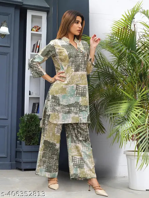 Indian printed cord set for women, featuring a round neck top and bottom sets made from polycotton fabric. Short-sleeved, available in sizes S, M, XXL. Part of the One Amore western wear collection