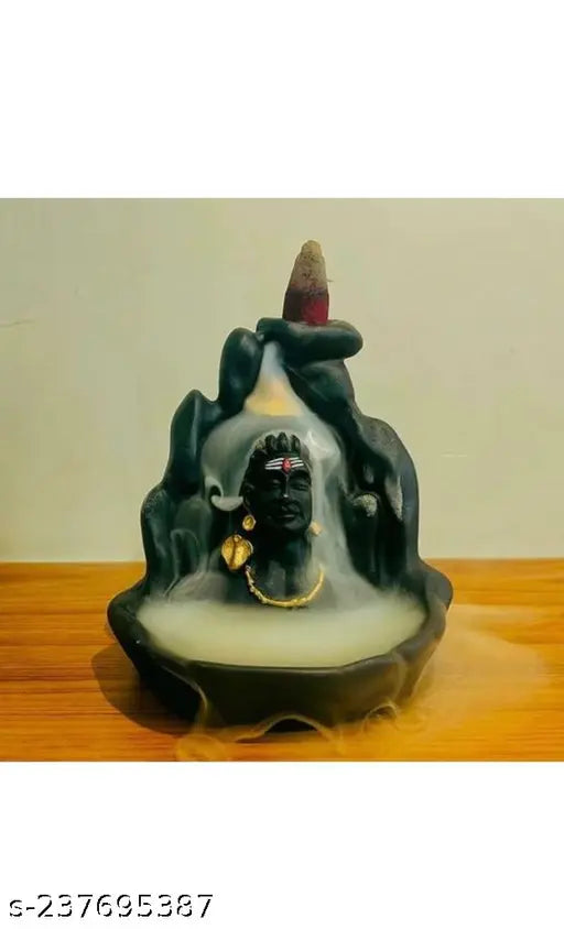 Handcrafted black resin Adi Shankara incense holder, featuring Lord Adiyogi Mahadev. Includes 30 backflow scented cones. Decorative showpiece from India