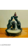 Handcrafted black resin Adi Shankara incense holder, featuring Lord Adiyogi Mahadev. Includes 30 backflow scented cones. Decorative showpiece from India