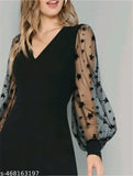 Black lycra V-neck jumpsuit with sheer starprint sleeves, perfect for parties and special occasions
