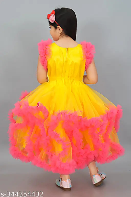 Orange net frock for girls, sleeveless embellished knee-length dress made in India