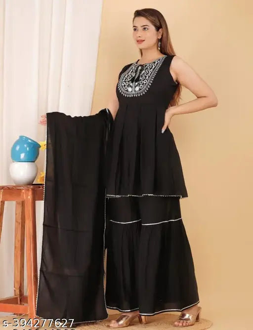 Black Rayon Kurta Sharara Set with Dupatta for Women - Elegant, lightweight, and versatile rayon fabric makes this set suitable for various occasions. Perfect for festive, daily, casual, office, or evening wear. Includes 1 kurti, 1 sharara, and 1 dupatta