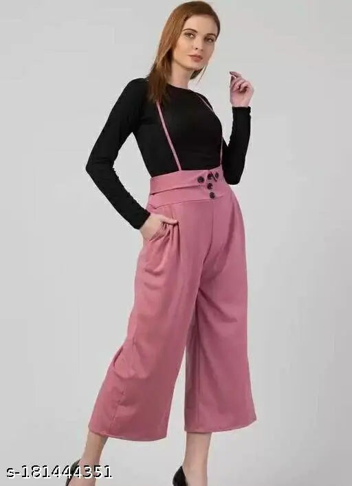Pink cotton blend jumpsuit with inner, long sleeves, solid pattern on a woman in casual setting