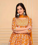 Mustard Rayon sharara set with dupatta and bottomwear, printed with Gota work. Traditional Indian ethnic wear for women, suitable for weddings or festivals. Available in sizes S-XXL. Made in India