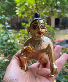 Hand-painted brass Krishna idol, modern Laddoo Gopal statue with intricate netr shringar and gold color finish. Perfect for home decor or office table sculpture during Janmashtmi festival, Hindu religious celebrations. (8*5*8 cm) Made in India