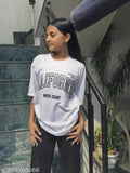 Large cotton California oversize t-shirt with printed design, stylish loose fit for women and girls