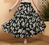 Black Neoen floral print crepe skirt, size 28 (waist 34in, length 35in), featuring intricate floral design on net fabric