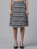 Printed polyester knee-length skirt, flared design with net pattern, size 26/28/30/32, made in India