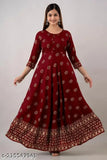 Maroon rayon Anarkali kurti with gold print, ideal for office/party wear, styled with accessories and high heels