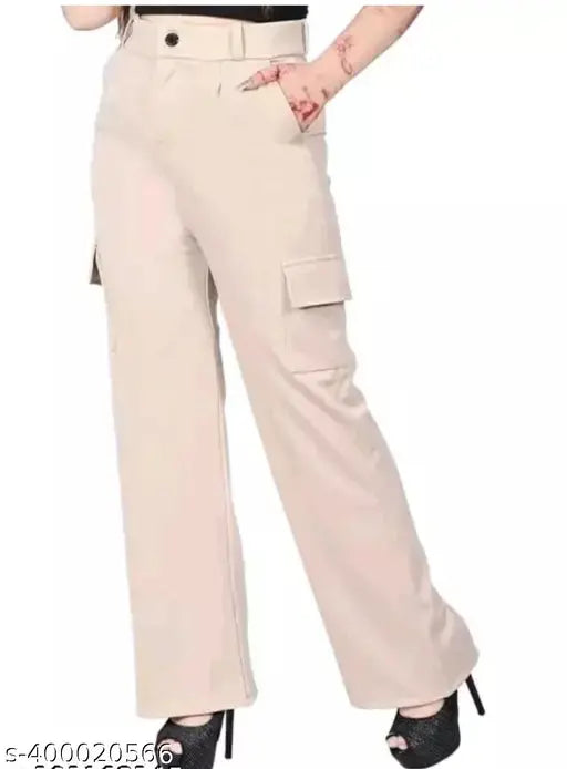 Cotton blend self-design bell bottom pants for girls, featuring four pockets - size 30 (waist 30", length 36") or size 32 (waist 32", length 36"). Made in India
