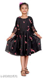Black Georgette embroidered fit and flared dress, featuring short sleeves and a length of 29-32 inches. Dress can be fitted for bust sizes 26-34 inches and waist sizes 20-28 inches. Made in India with attached inner lining. Dry clean or hand wash