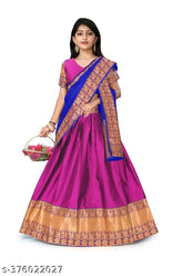 Art Silk South Indian flared lehenga-choli with striped stitch and zari pattern, unstitched. Best quality fabrics from Tirupati Enterprise, perfect for a stunning look with matching jewelry and heels or flats. Size: 32" (13-14 years), 37" (14-15 years), 40" (15-16 years), 44" (free size)