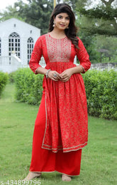 Designer rayon embroidered Nyra cut kurti set with palazzos, three-quarter sleeves, vibrant Indian print