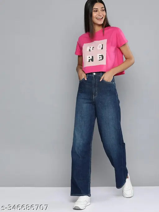 Affordable pink peach printed cotton t-shirt for women, short sleeves on display