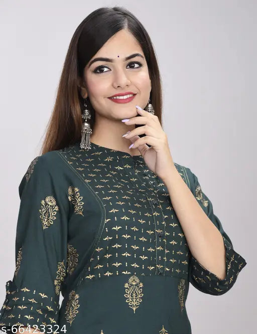 Stylish rayon kurta and palazzo set with printed net pattern, three-quarter sleeves. Women's traditional fashion for functions, festivals, parties, or weddings. Indian origin