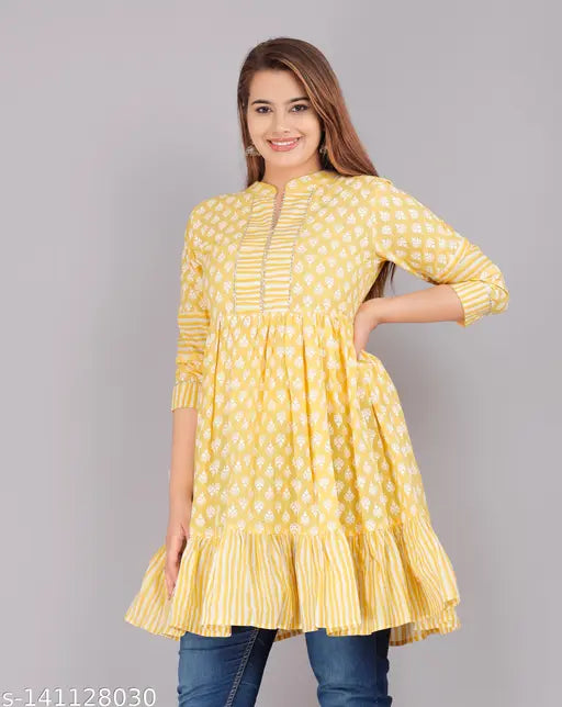 Yellow cotton Treandy tops with 3/4 sleeves, embellished print design, India origin