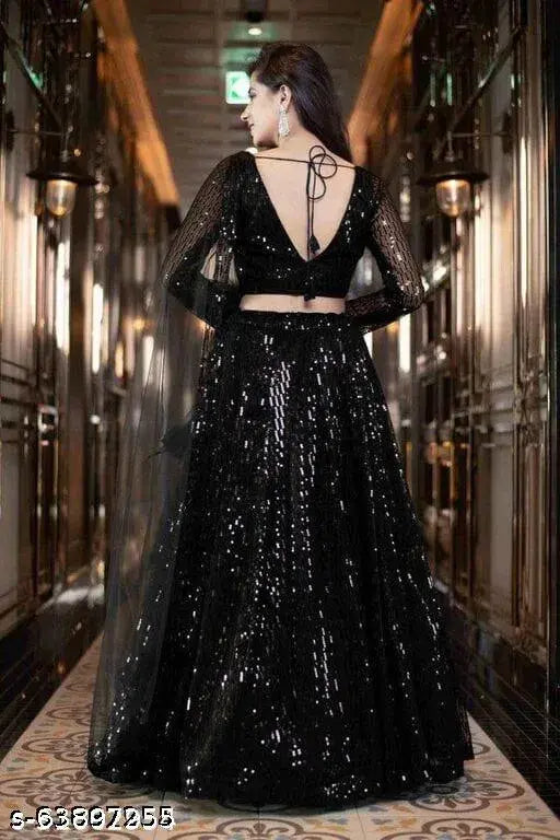 Black embroidered net lehenga with semi-stitched choli and dupatta, suitable for weddings and festive occasions. Indian craftsmanship showcased