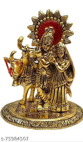 Metal Radha Krishna idol with cow, traditional Indian Krishna statue depicting deity and cow in temple setting