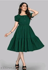 Bottle green rayon party dress for women, three-quarter sleeves solid design. S: 36", M: 38", L: 40", XL: 42", XXL: 44". Indian-made evening wear on mannequin