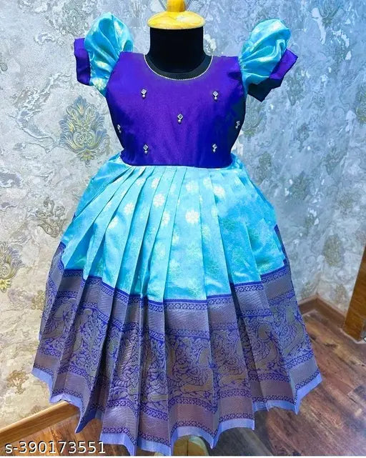 Silk net ethnic gown for 1-2, 2-3, or 3-4 years old. Classic Indian girls' clothing on mannequin