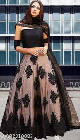 Embroidered black semi-stitched lehenga choli set on mannequin, Indian net fabric and intricate embroidery details