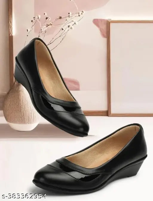 Black patent leather ballerinas by Laxmi Trace for women, solid design with slip-on fastening and back detail