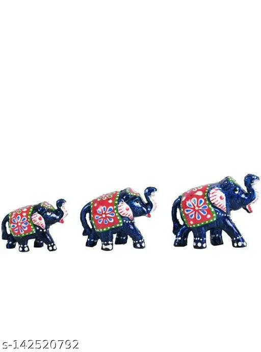 Blue resin elephant statue set of 3 for home decoration by SJC, featuring small (8x5.5 cm), medium (8x7 cm), and large (10x8 cm) sizes from India